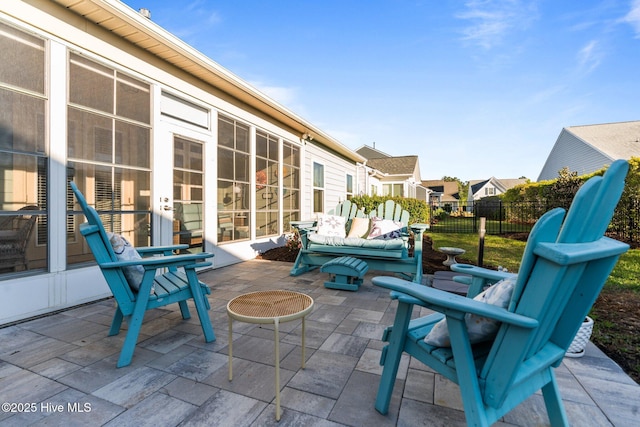 view of patio / terrace featuring fence and an outdoor living space