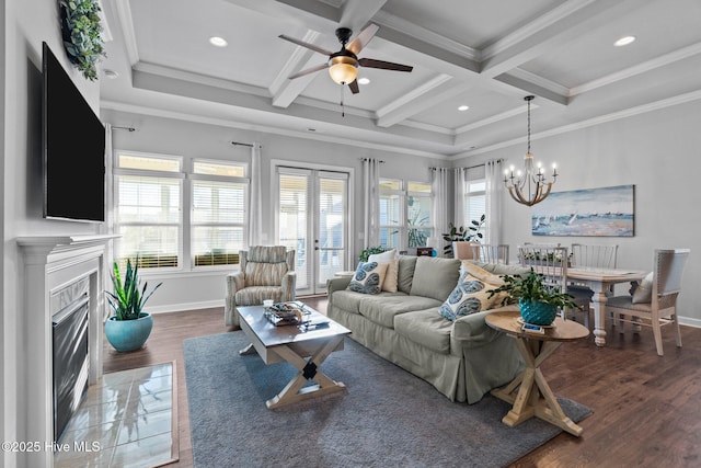 living area with beamed ceiling, baseboards, coffered ceiling, and crown molding