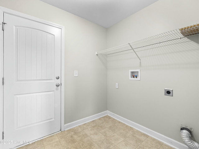 clothes washing area featuring baseboards, hookup for an electric dryer, laundry area, and washer hookup