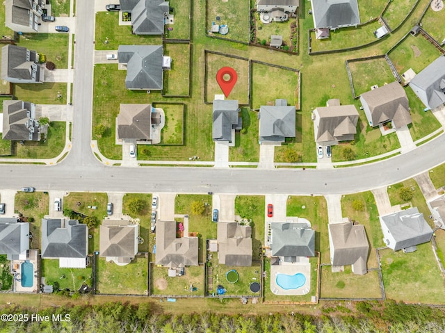 drone / aerial view featuring a residential view