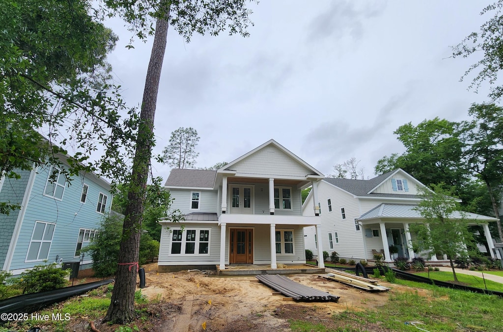 305 Jenoa Dr, Castle Hayne, NC 28429 - view of front of property featuring a porch, metal roof, and a standing seam roof