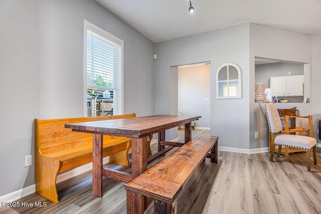 301 Softwood Ct, Jacksonville, NC 28540 - dining space with light wood-style flooring and baseboards