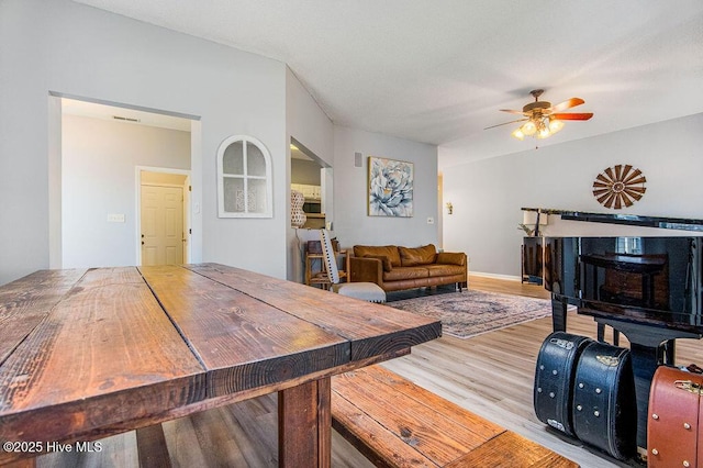 301 Softwood Ct, Jacksonville, NC 28540 - dining room with a ceiling fan and wood finished floors