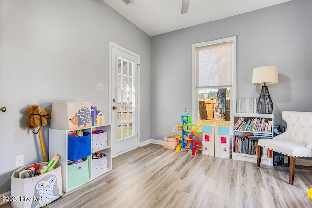 301 Softwood Ct, Jacksonville, NC 28540 - playroom featuring baseboards, a ceiling fan, and wood finished floors
