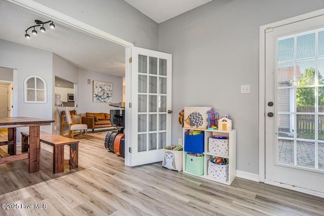 301 Softwood Ct, Jacksonville, NC 28540 - rec room with baseboards and wood finished floors