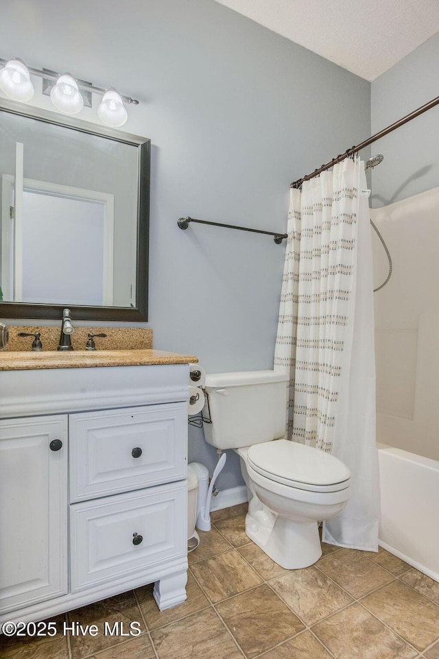 301 Softwood Ct, Jacksonville, NC 28540 - bathroom featuring shower / bath combination with curtain, vanity, and toilet