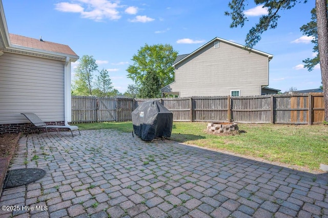 301 Softwood Ct, Jacksonville, NC 28540 - view of patio featuring a fenced backyard and a grill