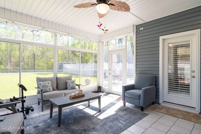 913 Wetherington Landing Rd, Stella, NC 28582 - sunroom with outdoor lounge area and a ceiling fan