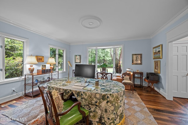 dining room with crown molding, baseboards, visible vents, and dark wood-type flooring