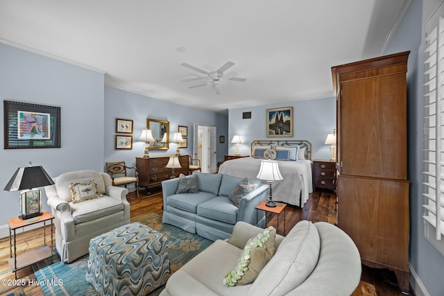 bedroom featuring crown molding and dark wood-style flooring