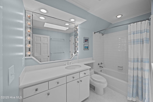 bathroom featuring toilet, tile patterned flooring, shower / bath combo, and vanity