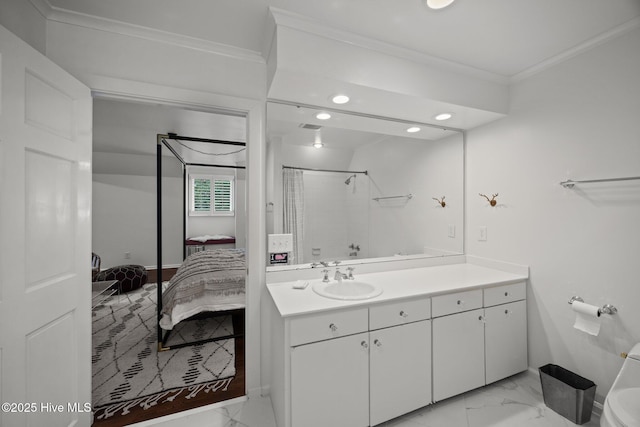 ensuite bathroom with vanity, marble finish floor, ensuite bathroom, ornamental molding, and a stall shower