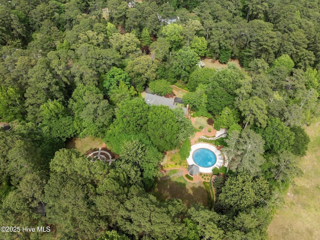 drone / aerial view with a view of trees