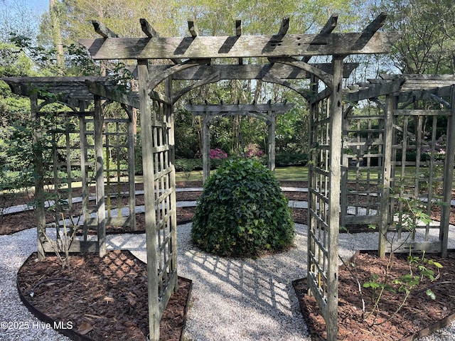 view of property's community with a pergola