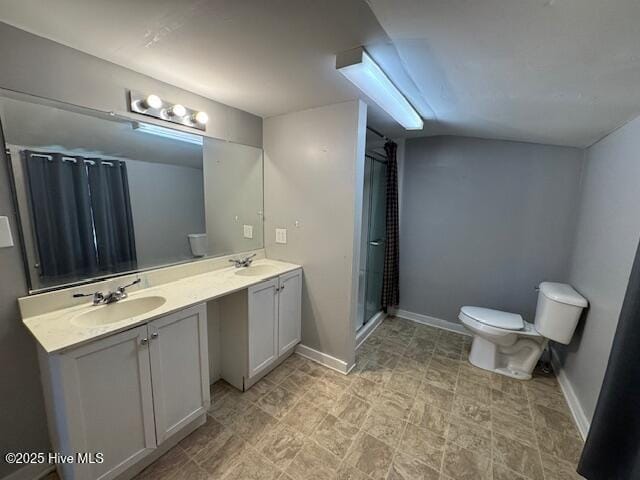 224 Millennium Rd # B, Aulander, NC 27805 - bathroom with baseboards, a sink, toilet, a shower stall, and double vanity