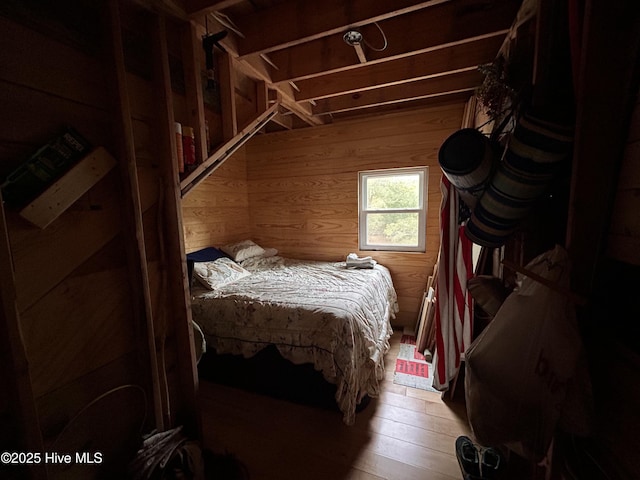 388 Matthews Rd, Bayboro, NC 28515 - bedroom featuring wooden walls and wood finished floors