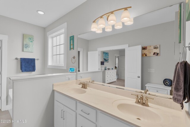 555 Heartwood Dr, Leland, NC 28479 - bathroom with a sink and double vanity
