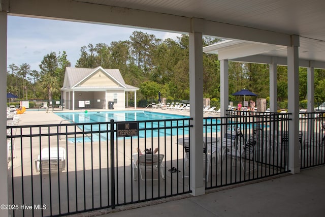 555 Heartwood Dr, Leland, NC 28479 - pool with a patio area and fence