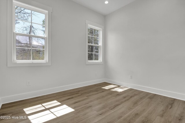 1205 Mackerel Ln Unit 2, Carolina Beach, NC 28428 - unfurnished room with recessed lighting, baseboards, and wood finished floors