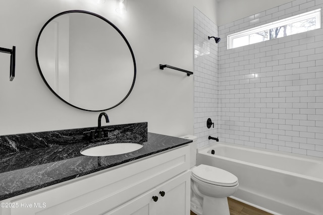1205 Mackerel Ln Unit 2, Carolina Beach, NC 28428 - full bath featuring toilet, vanity, and washtub / shower combination