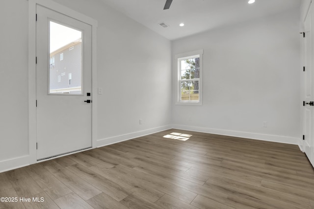 1205 Mackerel Ln Unit 2, Carolina Beach, NC 28428 - empty room featuring recessed lighting, visible vents, baseboards, and wood finished floors