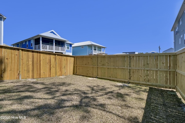 1205 Mackerel Ln Unit 2, Carolina Beach, NC 28428 - view of yard with fence