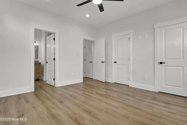 1205 Mackerel Ln Unit 2, Carolina Beach, NC 28428 - unfurnished bedroom with recessed lighting, light wood-type flooring, baseboards, and connected bathroom