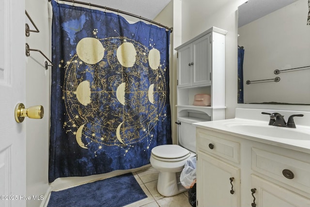 bathroom featuring a shower with shower curtain, toilet, a textured ceiling, vanity, and tile patterned floors