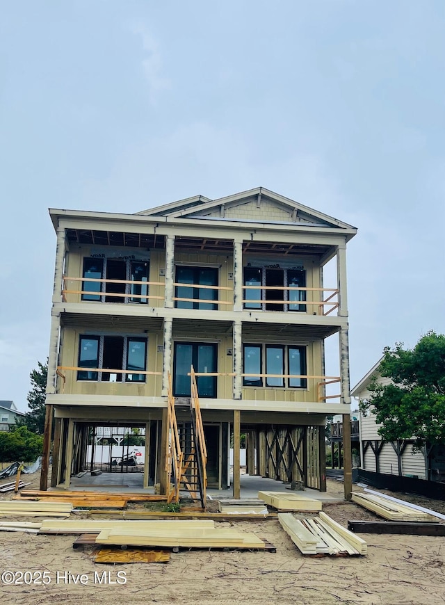 301 Brunswick Ave W, Holden Beach, NC 28462 - view of property with stairs