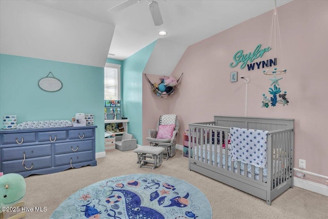 bedroom featuring ceiling fan, baseboards, vaulted ceiling, and carpet floors