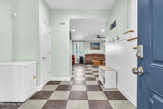 foyer featuring visible vents, baseboards, a ceiling fan, recessed lighting, and stairway