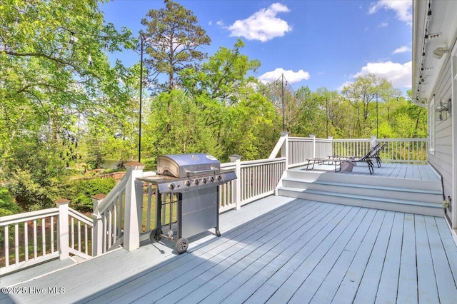 wooden terrace with grilling area