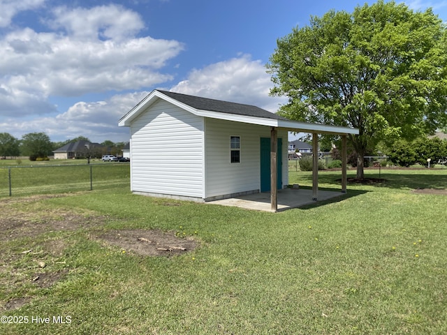 view of outdoor structure with fence