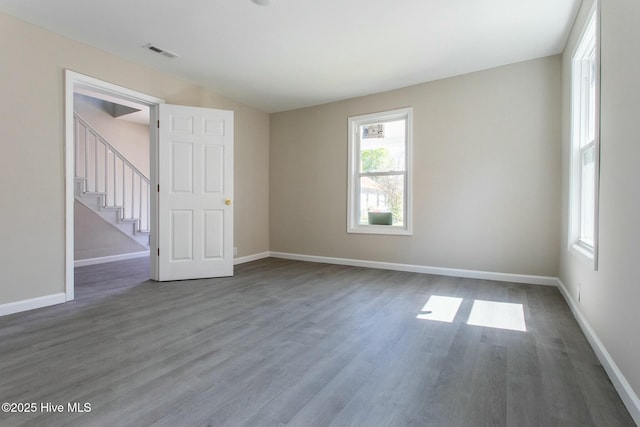 915 N Broad St, Edenton, NC 27932 - spare room featuring wood finished floors, baseboards, and stairs