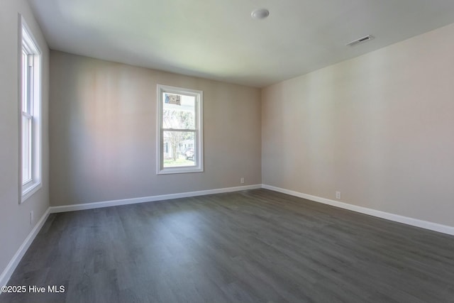 915 N Broad St, Edenton, NC 27932 - unfurnished room with dark wood finished floors and baseboards
