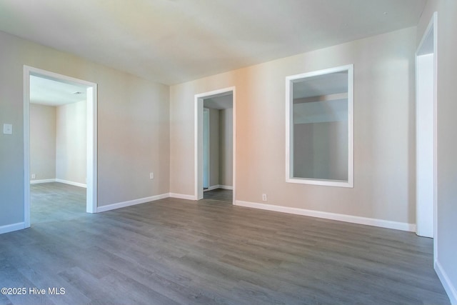 915 N Broad St, Edenton, NC 27932 - spare room featuring dark wood finished floors and baseboards