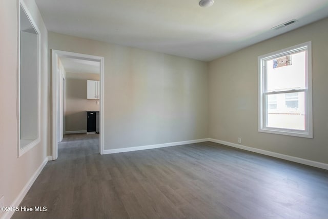 915 N Broad St, Edenton, NC 27932 - empty room featuring dark wood-style floors and baseboards