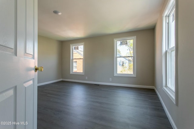 915 N Broad St, Edenton, NC 27932 - empty room with dark wood-type flooring and baseboards