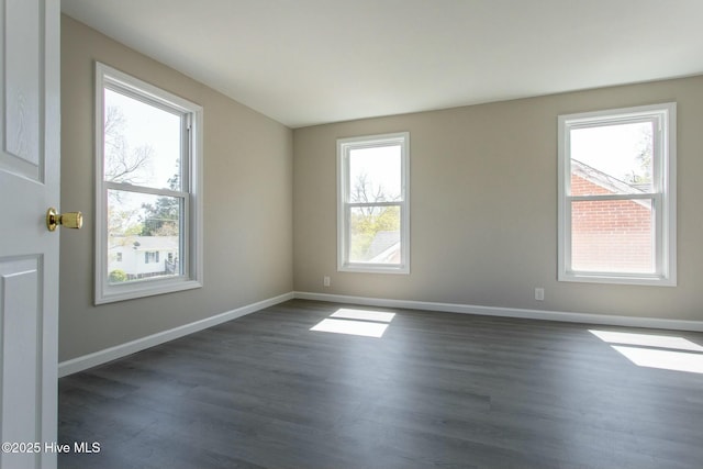 915 N Broad St, Edenton, NC 27932 - spare room with dark wood finished floors, plenty of natural light, and baseboards