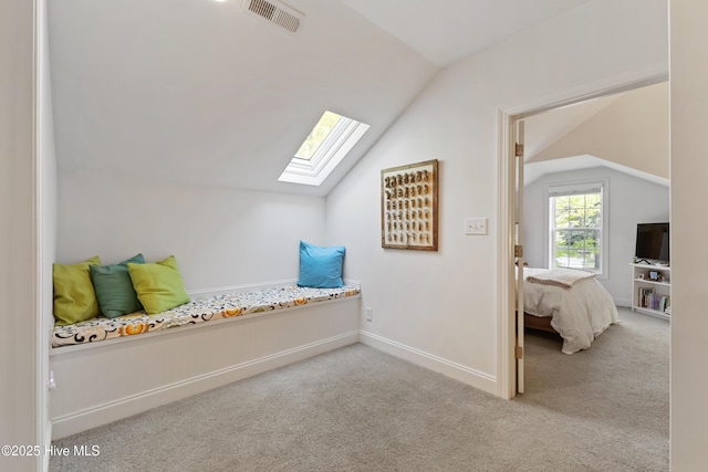 bonus room with visible vents, baseboards, carpet flooring, and lofted ceiling with skylight