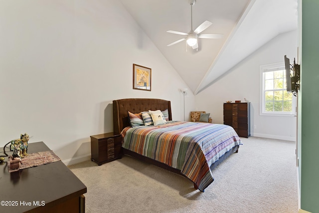 bedroom featuring baseboards, vaulted ceiling, and light carpet