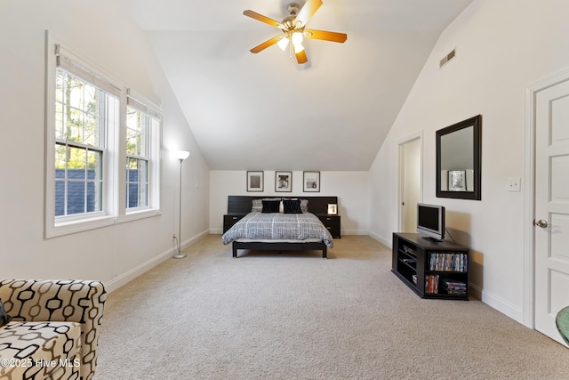 bedroom with ceiling fan, visible vents, vaulted ceiling, carpet flooring, and baseboards