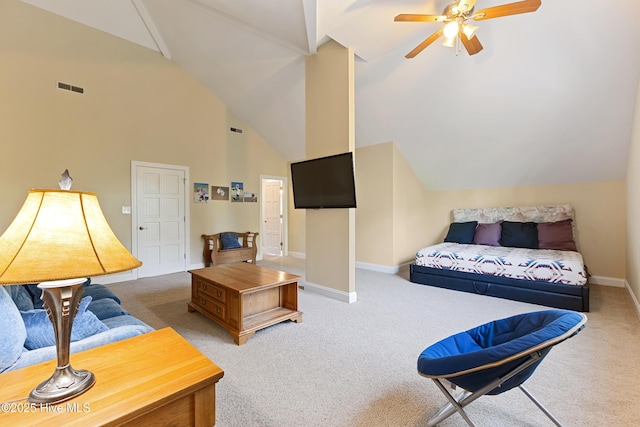 living room with baseboards, carpet floors, visible vents, ceiling fan, and high vaulted ceiling
