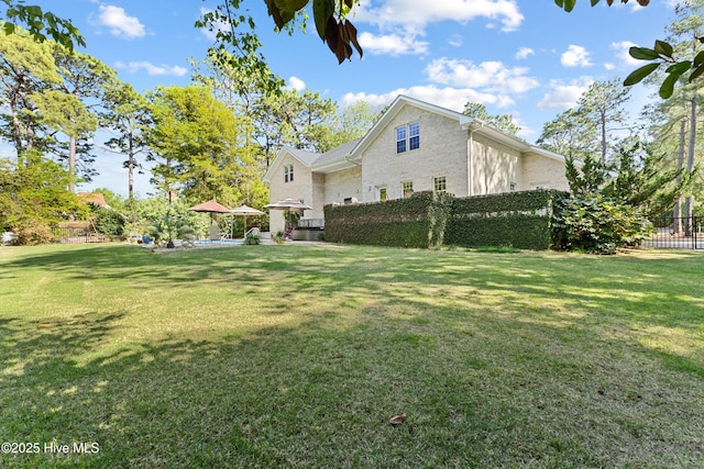 view of yard with fence