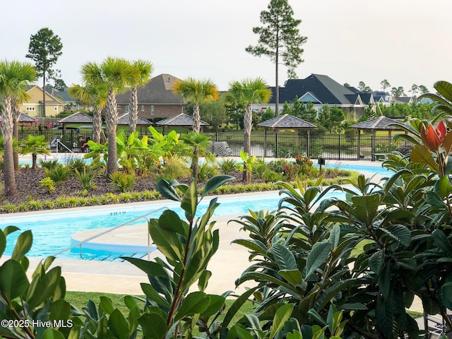 8372 S Shoreside Way NE, Leland, NC 28451 - community pool featuring a residential view