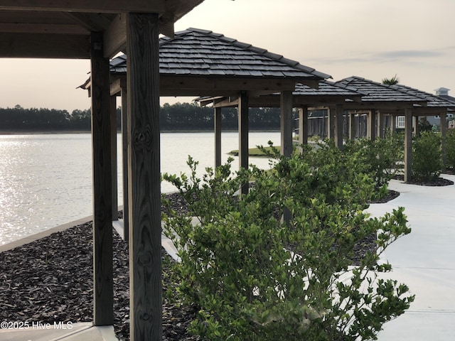 8372 S Shoreside Way NE, Leland, NC 28451 - dock featuring a water view and a gazebo