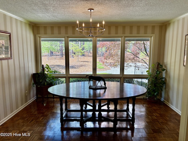207 Bump A Long Ln, Southern Pines, NC 28387 - dining area featuring a chandelier, a textured ceiling, and wallpapered walls