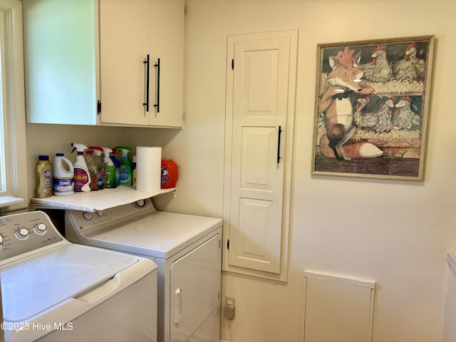 207 Bump A Long Ln, Southern Pines, NC 28387 - clothes washing area featuring washer and dryer and cabinet space