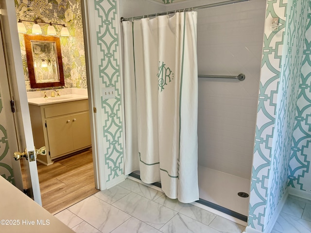 207 Bump A Long Ln, Southern Pines, NC 28387 - bathroom featuring tiled shower, marble finish floor, and vanity