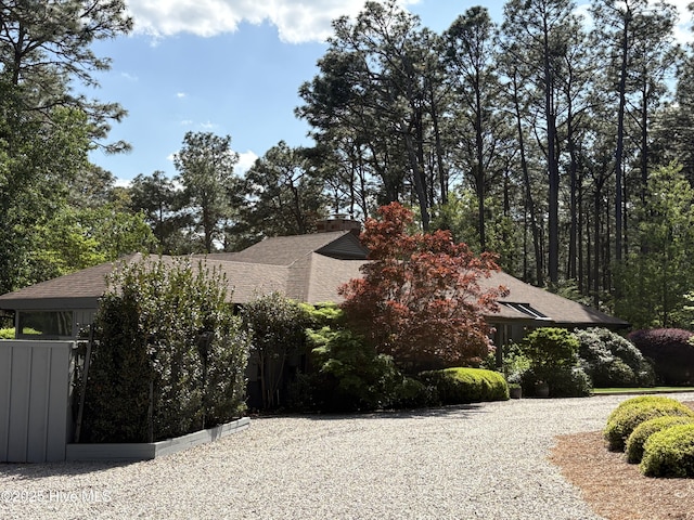 207 Bump A Long Ln, Southern Pines, NC 28387 - view of property exterior with roof with shingles